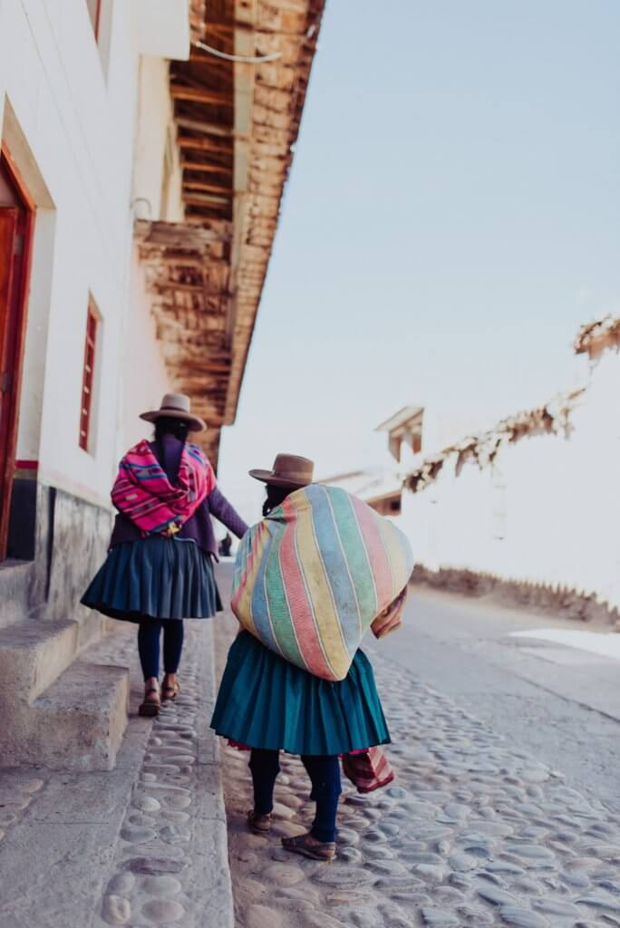 Women on a street in Peru.