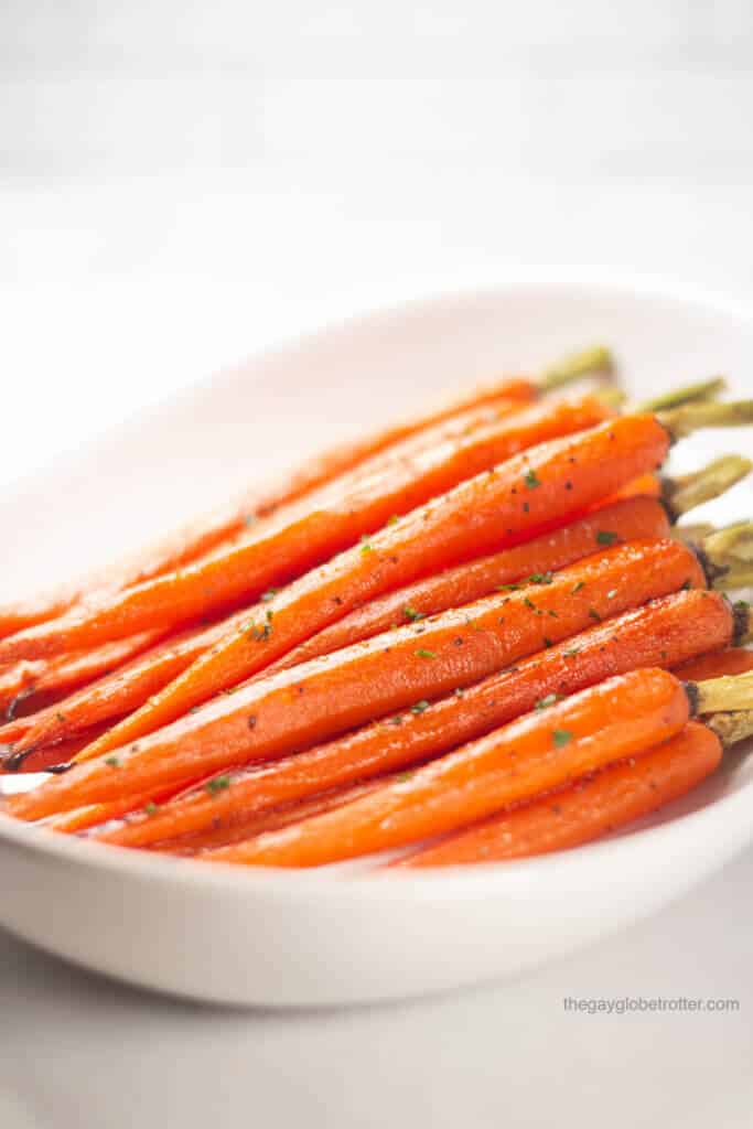 Honey glazed carrots on a serving platter. 