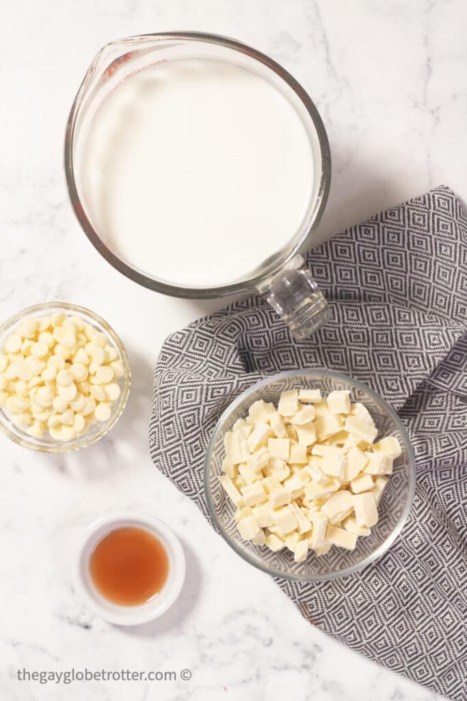 White hot chocolate ingredients next to a tea towel.