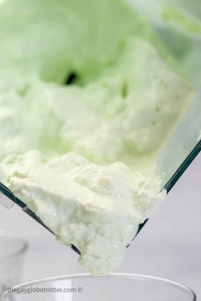 Shamrock shake ingredients in a blender.